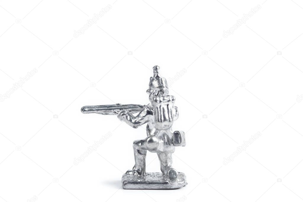 Image of uncolored handmade soldier on the white background