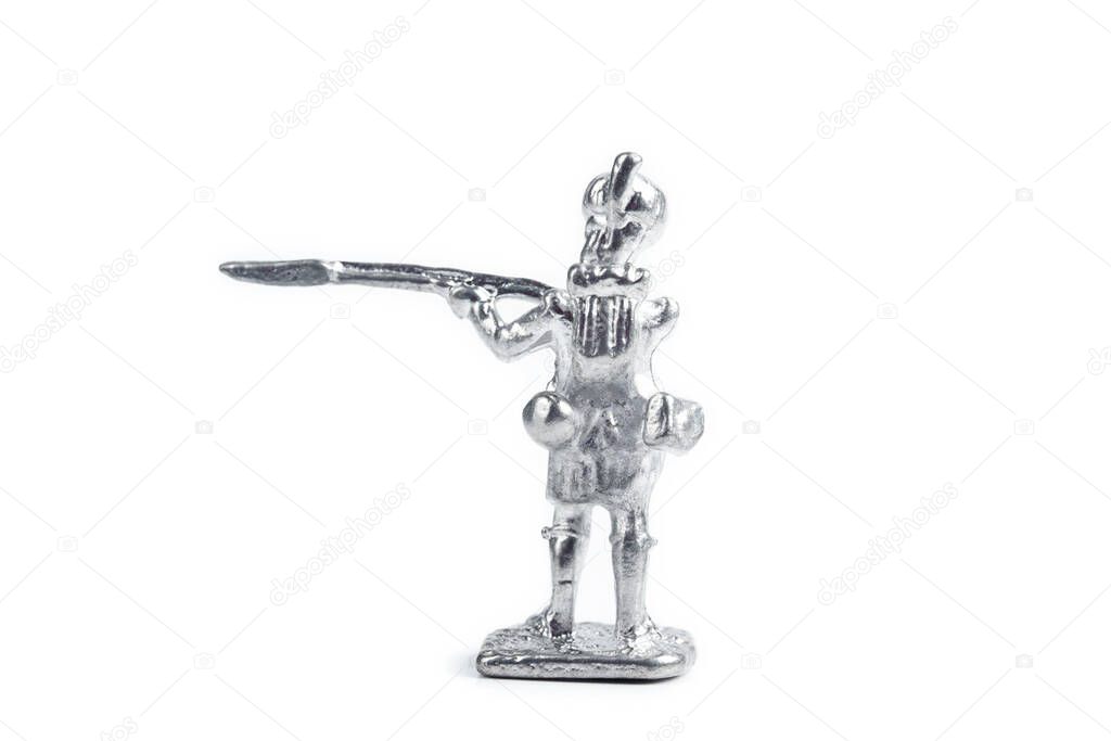 Image of unpainted handmade metal soldier on white background