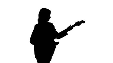 Video of womans silhouette with bass guitar on isolated white background