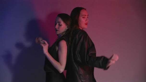 Video of dancing women in red and blue light — Stock Video