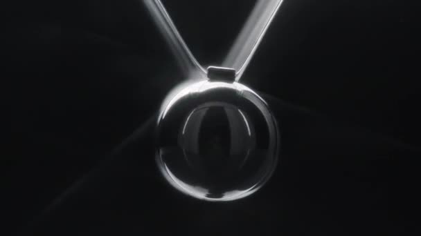 Video of hanged steel newton s balls like a eye in motion — Stock Video