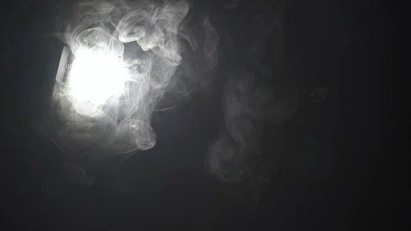 Foto av lampa i moln av rök — Stockfoto