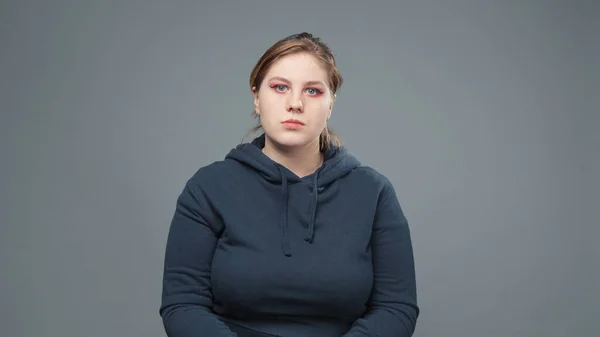 Photo of serious stout woman in sweatshirt — Stock Photo, Image
