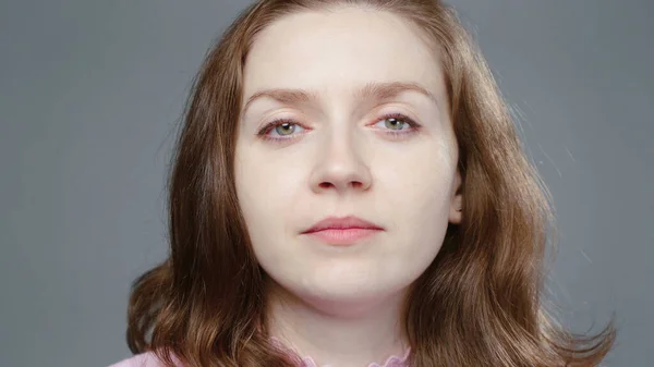 Portrait of young woman in pink turtleneck — Stock Photo, Image