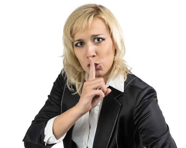 O femeie de afaceri ţinându-şi degetul lângă gură — Fotografie, imagine de stoc