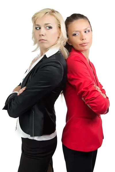 Twee zakenvrouw permanent back-to-back — Stockfoto