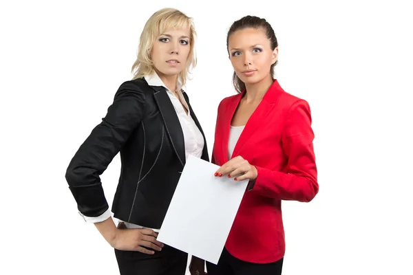 Two businesswoman and sheet of paper Royalty Free Stock Images