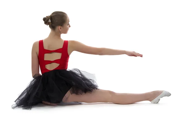 Young ballerina sitting back — Stock Photo, Image