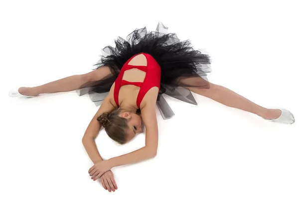 Bilden av stretching flicka med armarna korsade — Stockfoto