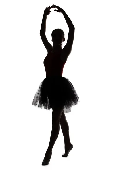 Silhouet van danser meisje met handen omhoog — Stockfoto