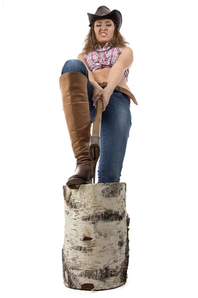 Image of young woman chops wood — Stock Photo, Image