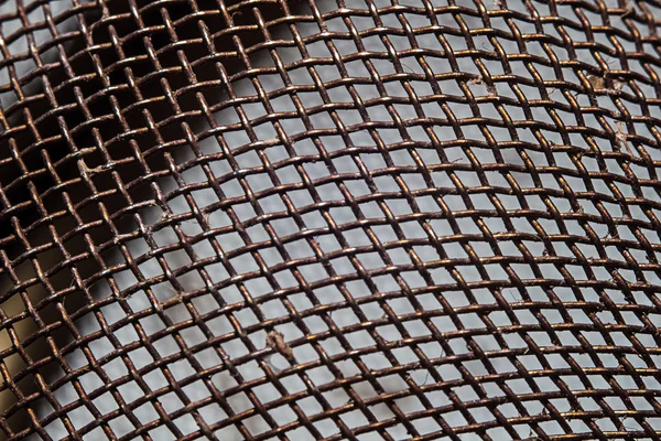 Photo of the rusty iron mesh — Stock Photo, Image