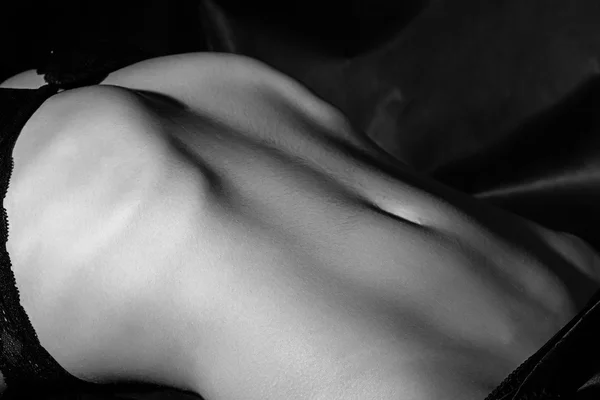 Black and white photo of beauty womans belly — Stock Photo, Image