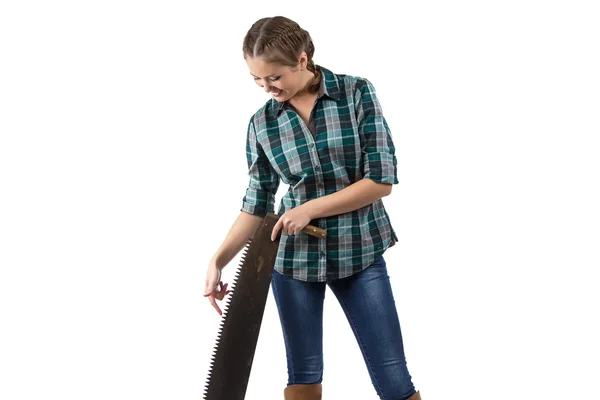 Portret van een jonge vrouw op zoek bij de hand zag — Stockfoto