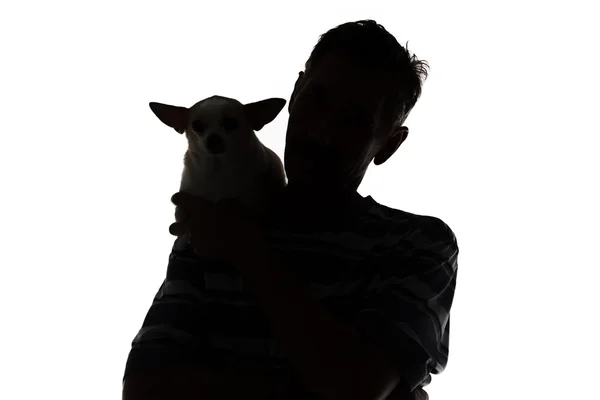 Силуэт взрослого мужчины с собакой — стоковое фото