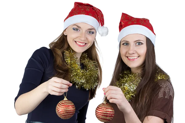 Bild von zwei jungen Frauen mit Weihnachtskugeln — Stockfoto