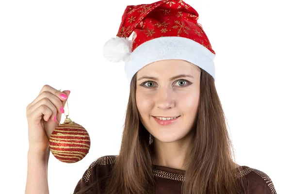 Фото молодой женщины, держащей рождественский бал — стоковое фото