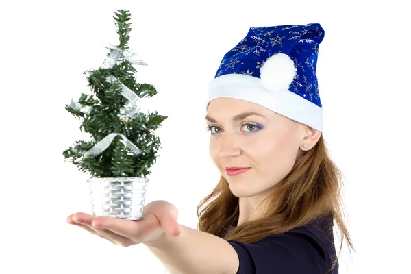 Mujer con abeto navideño pequeño — Foto de Stock