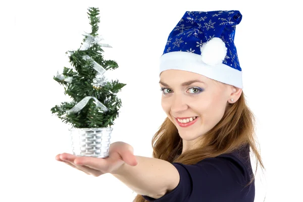 Mujer con el pequeño abeto de Navidad — Foto de Stock