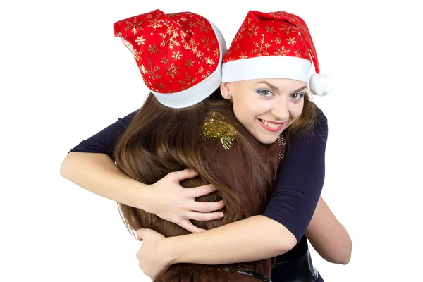Фото двух счастливых обнимающих молодых женщин — стоковое фото