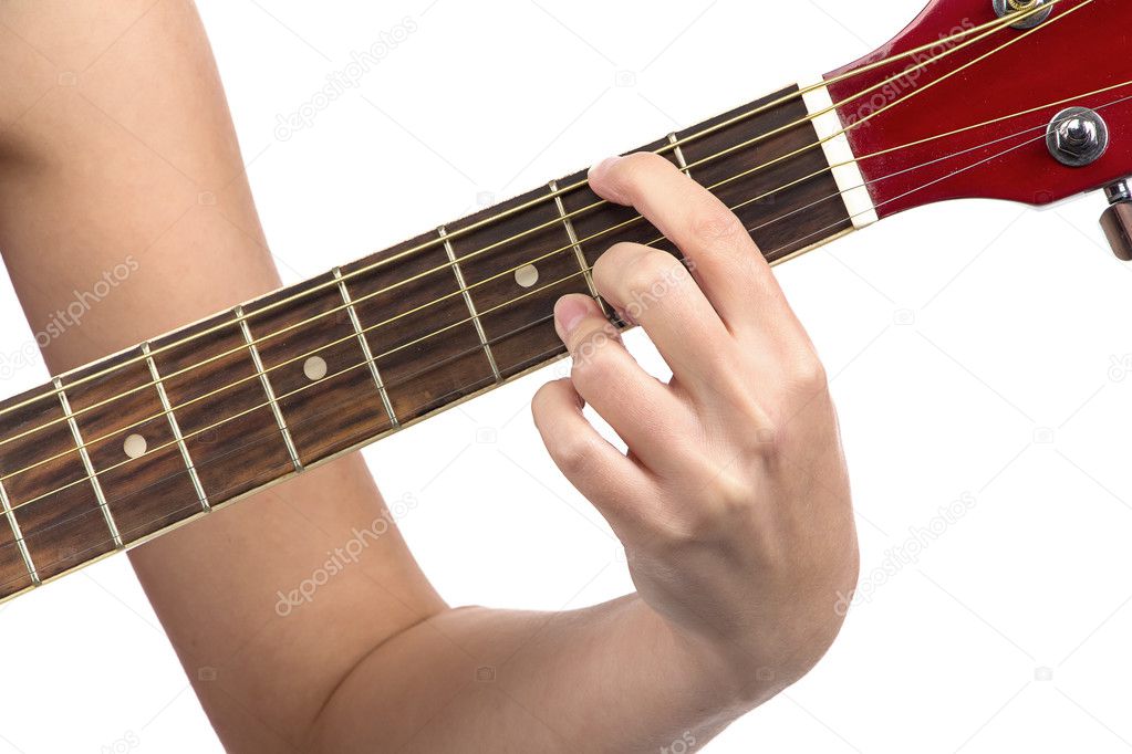 Image of womans fingers on guitar