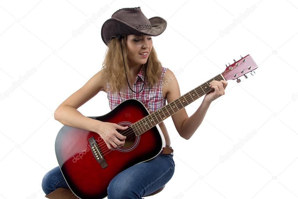 Image of woman playing guitar