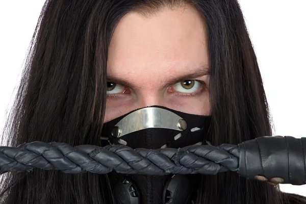 Image of young man with the whip in mask — Stock Photo, Image