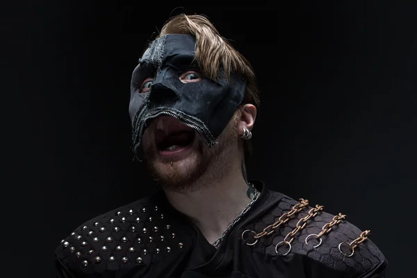 Portrait of the screaming blond man in mask — Stock Photo, Image