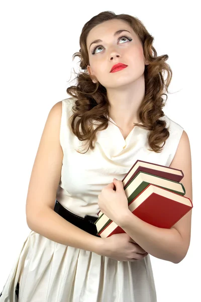 Photo of the dreaming woman with books — Stock Photo, Image