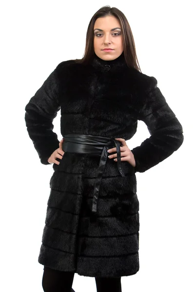 Portrait of the cute brunette in fur coat — Stock Photo, Image
