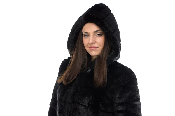 Portrait of woman in fake fur coat with hood — Stock Photo, Image