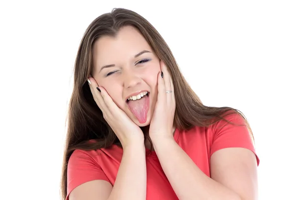 Foto de menina adolescente mostrando língua — Fotografia de Stock