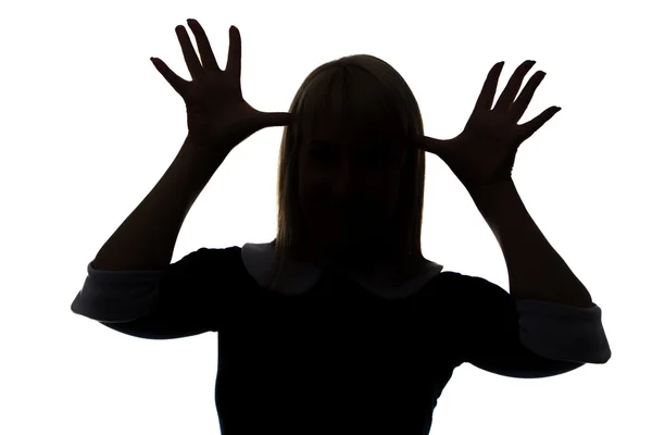 Silhouet van vrouw met palmen op hoofd — Stockfoto