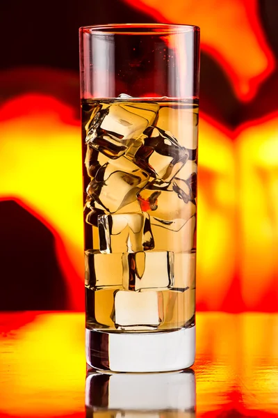 Glass of black tea and ice — Stock Photo, Image