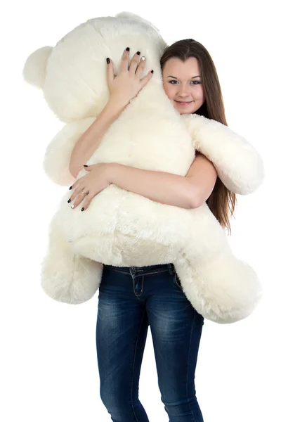 Chica adolescente de pie con oso de peluche blanco — Foto de Stock