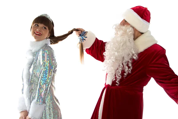 Foto de Santa segurando uma trança donzelas — Fotografia de Stock