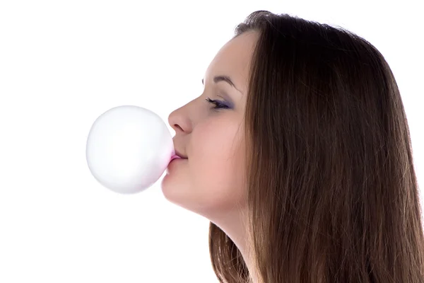 Teenage girl inflating the bubble — Stock Photo, Image