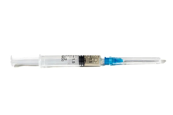 Foto de seringa isolada com líquido — Fotografia de Stock