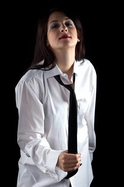 Foto van vrouw trekken stropdas — Stockfoto