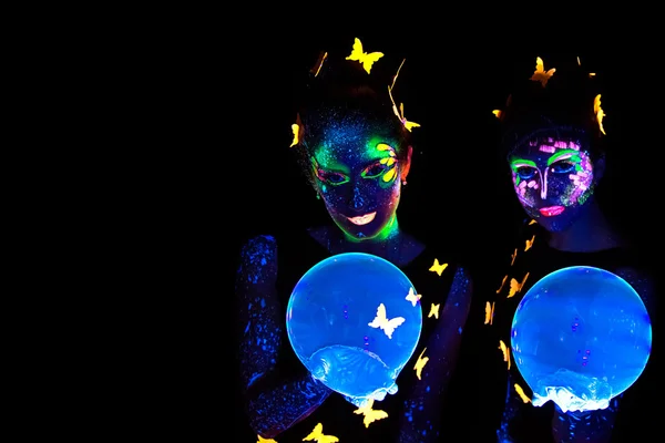 Two young woman with luminous make up and bubble — Stock Photo, Image