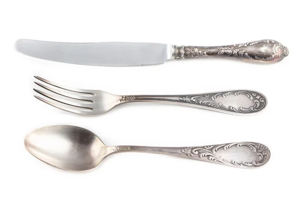 Image of antiquarian silver fork, spoon and knife — Stock Photo, Image