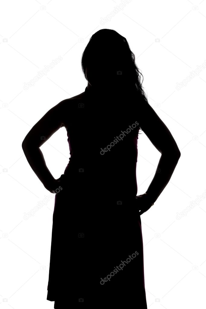 Silhouette of curvy woman with hands on hips