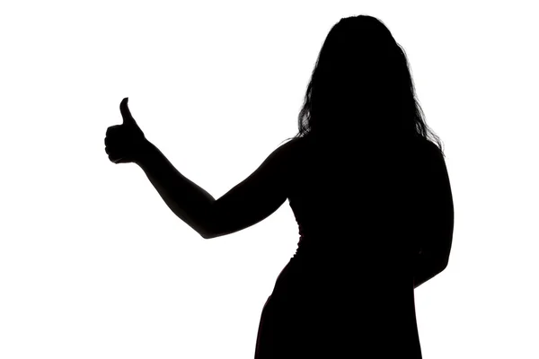 Silueta de mujer mostrando el pulgar — Foto de Stock