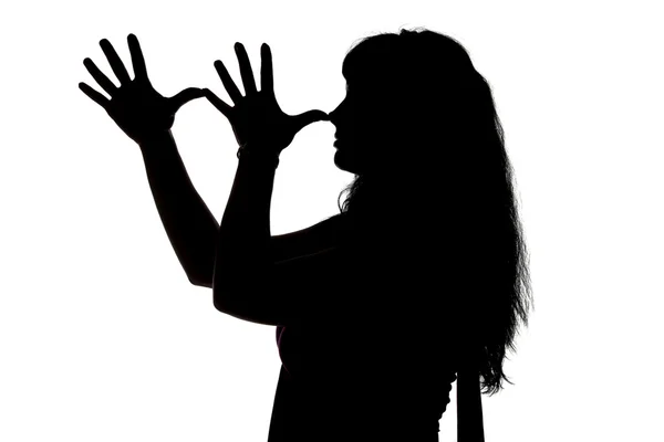 Silhouette of mocking woman — Stock Photo, Image