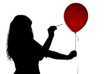 Bir iğne balon ile deldi kadın silüeti
