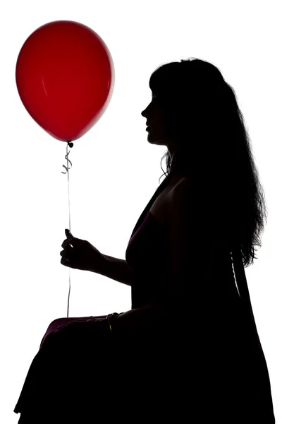 Foto van de vergadering van de dames silhouet met ballon — Stockfoto