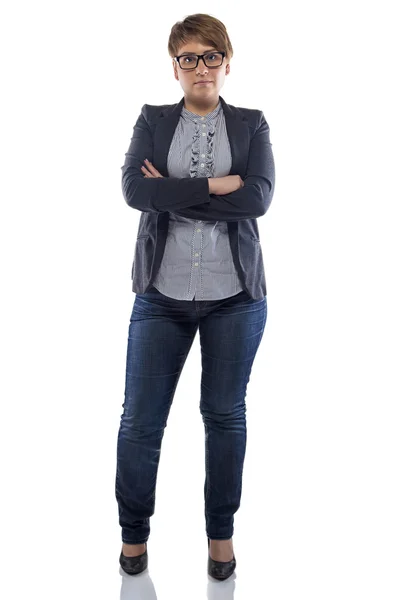 Photo pudgy woman in jeans with arms crossed — Stock Photo, Image