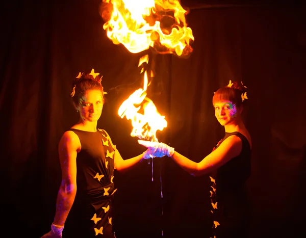 Image of two women holding fire — Stock Photo, Image