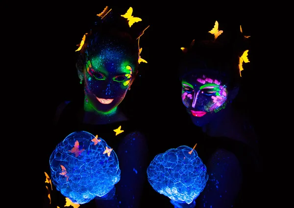 Photo of two women with luminous lather — Stock Photo, Image