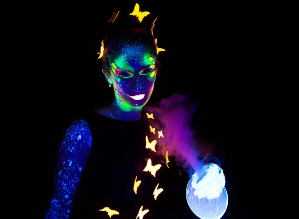 Photo of woman holding luminous steaming bubble — Stock Photo, Image